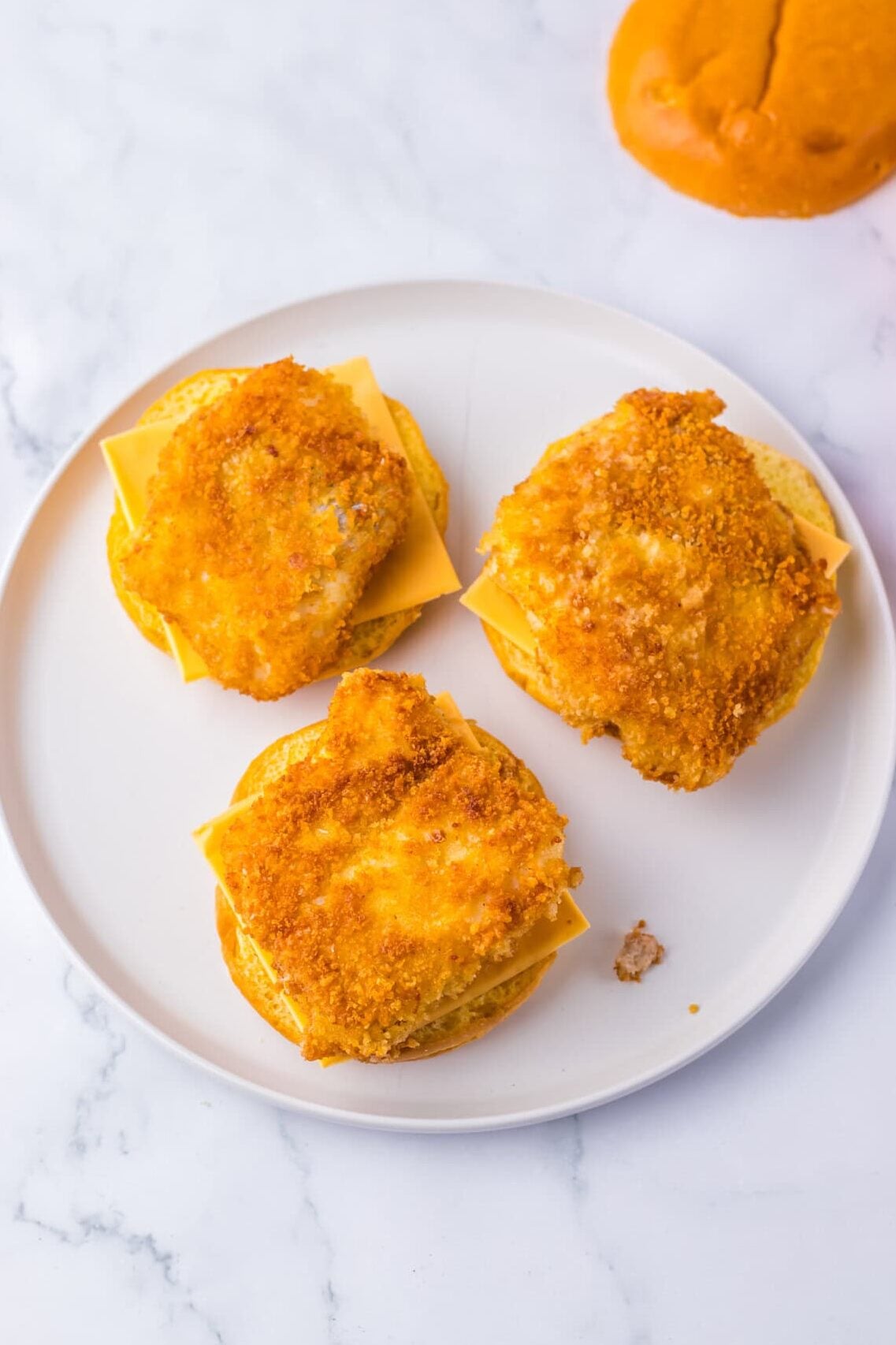 fish filet on a bun with cheese