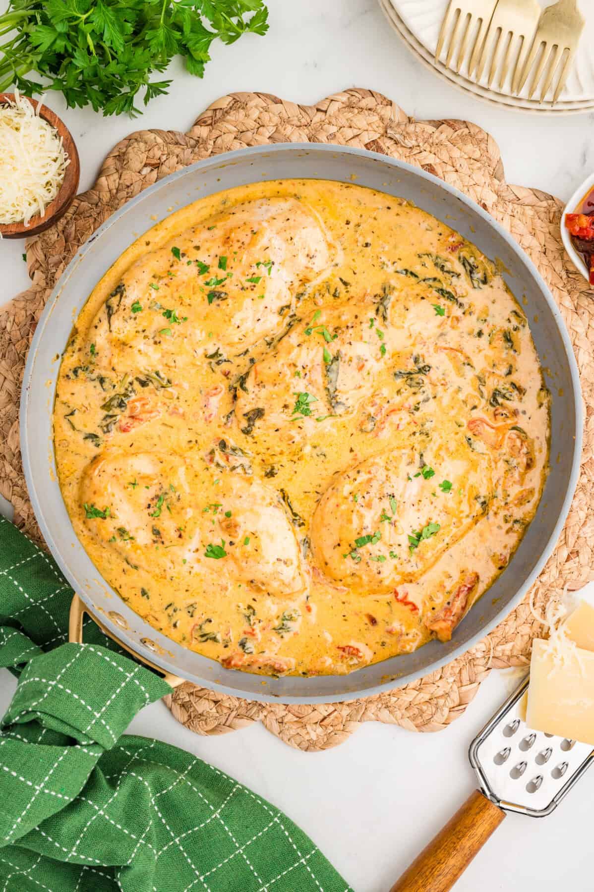 creamy tuscan chicken in a skillet