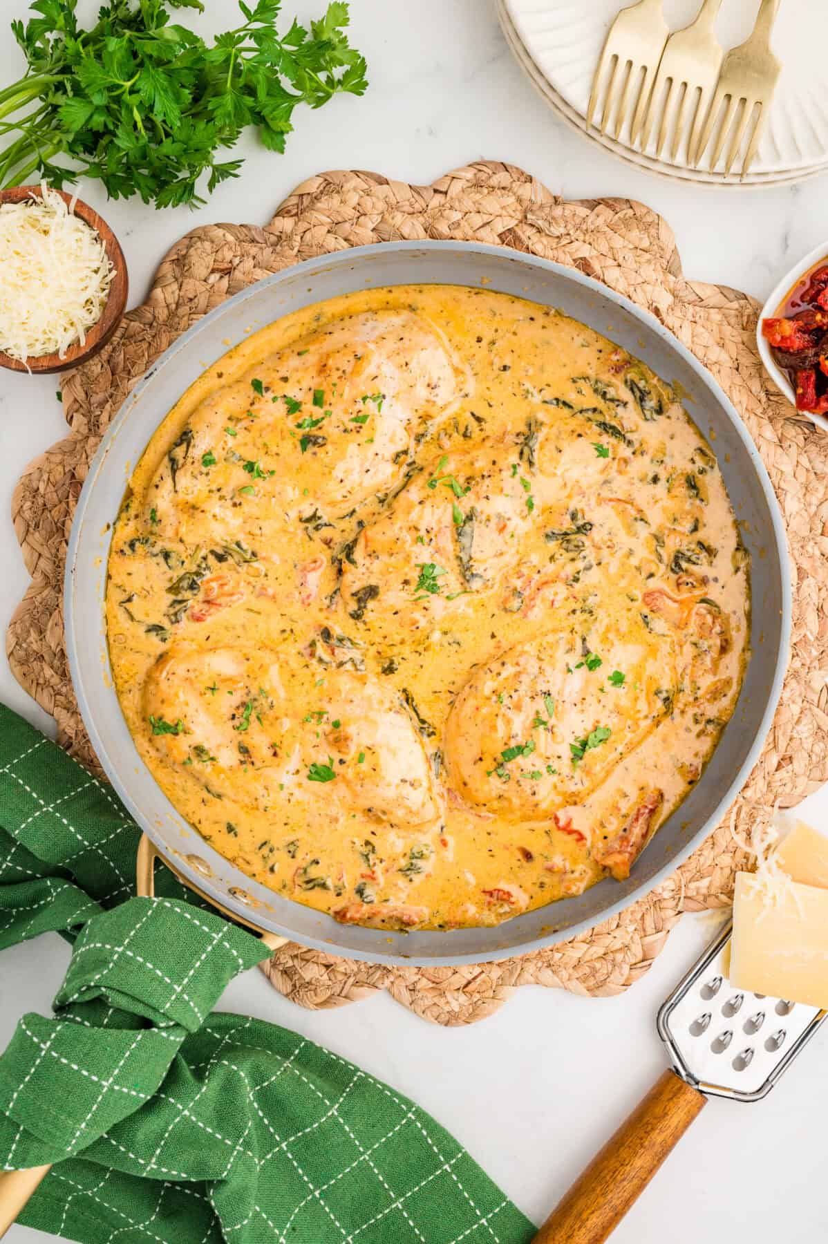 creamy tuscan chicken in a skillet