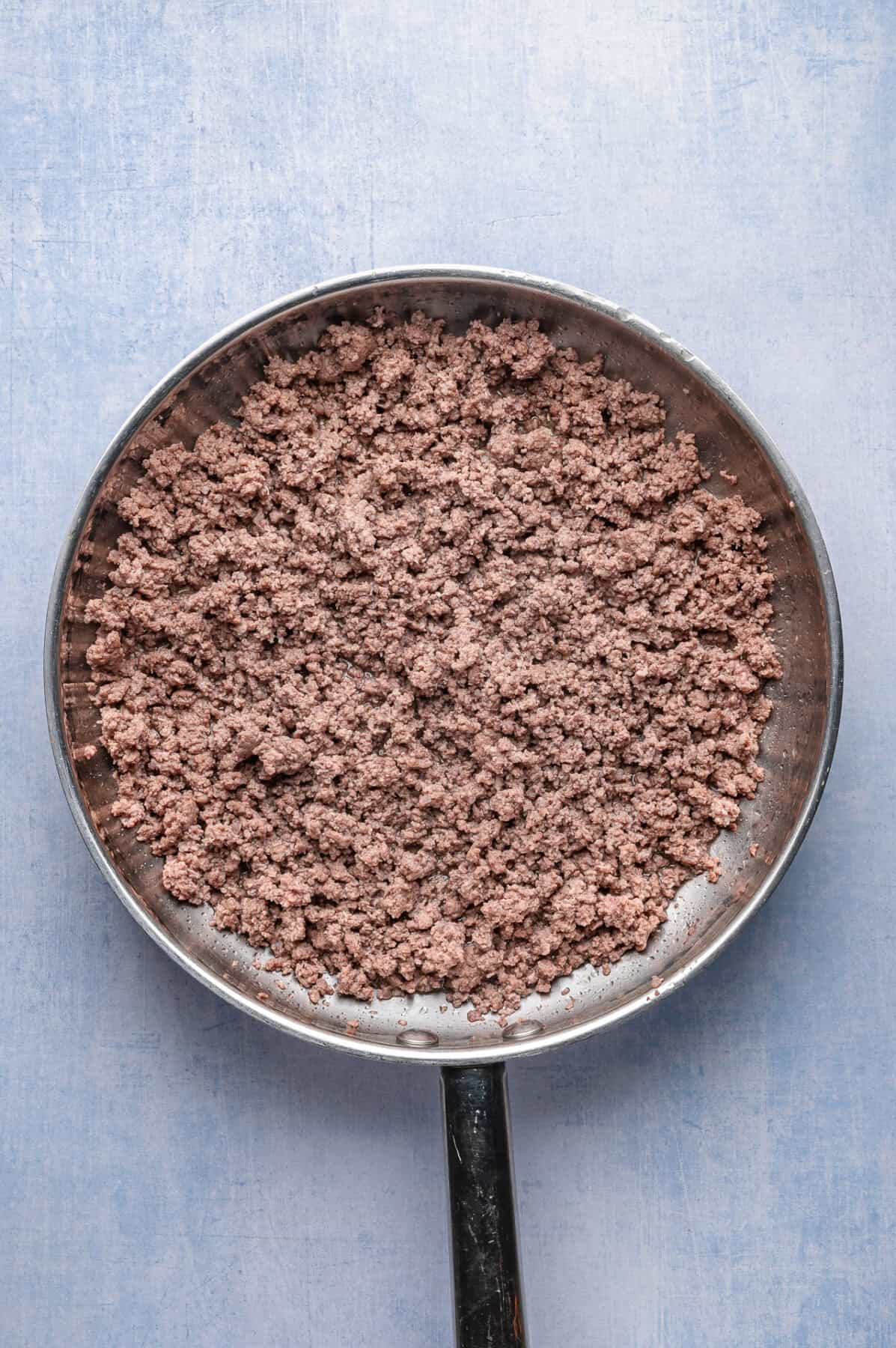 browned ground beef in skillet