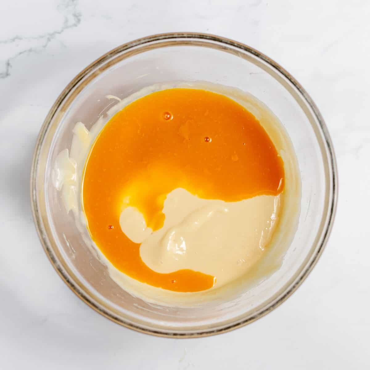 concentrated orange juice added to mixing bowl