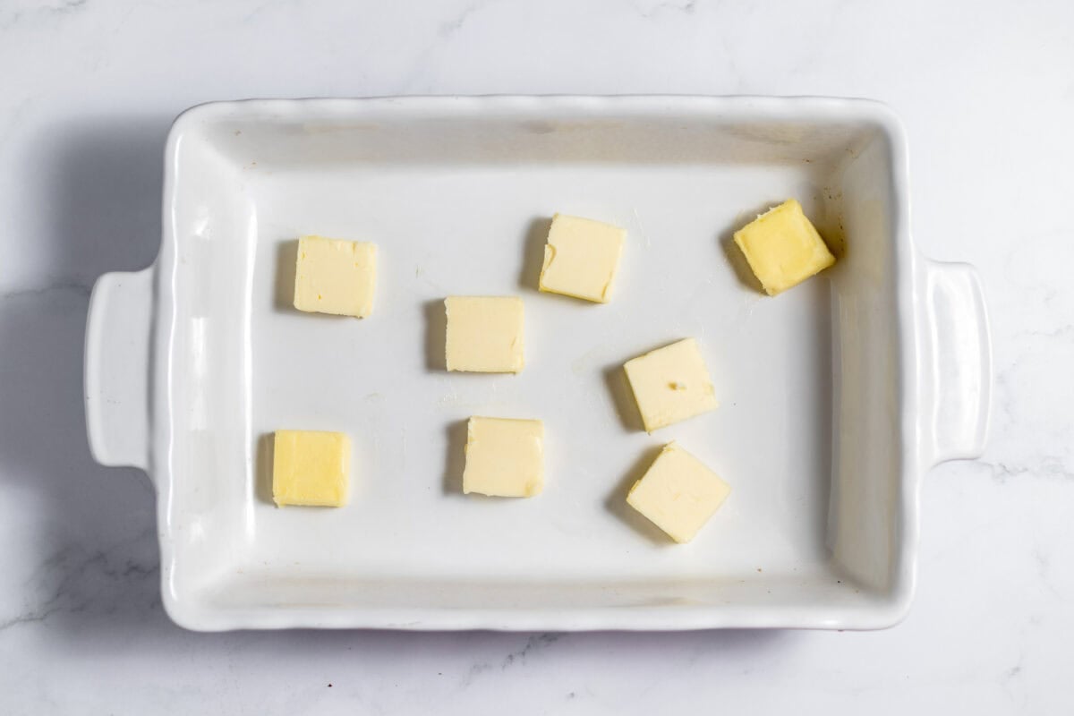 butter pats in baking dish