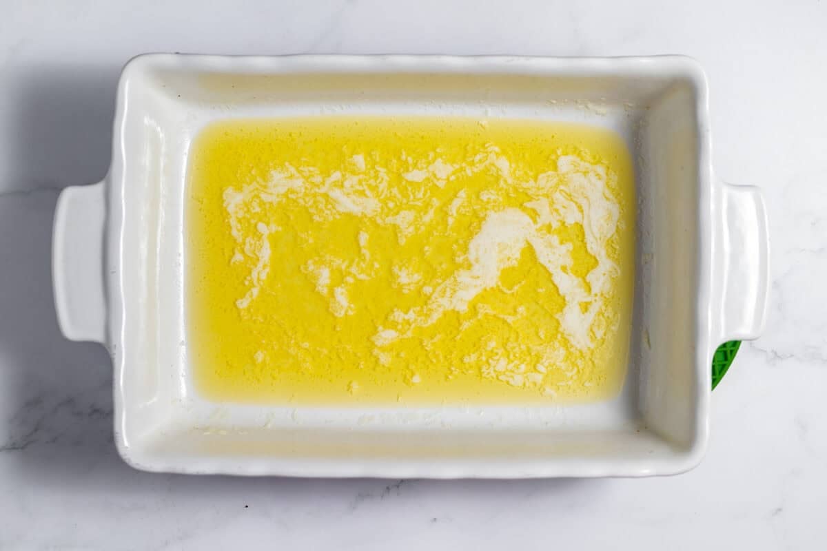 melted butter in baking dish