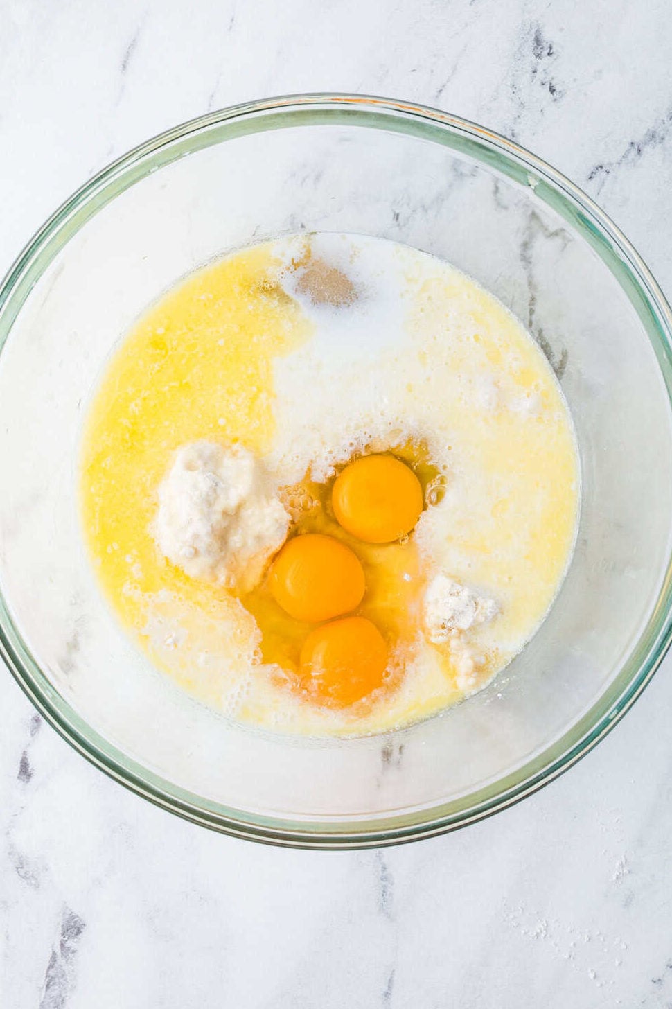 buttermilk pie ingredients in a mixing bowl