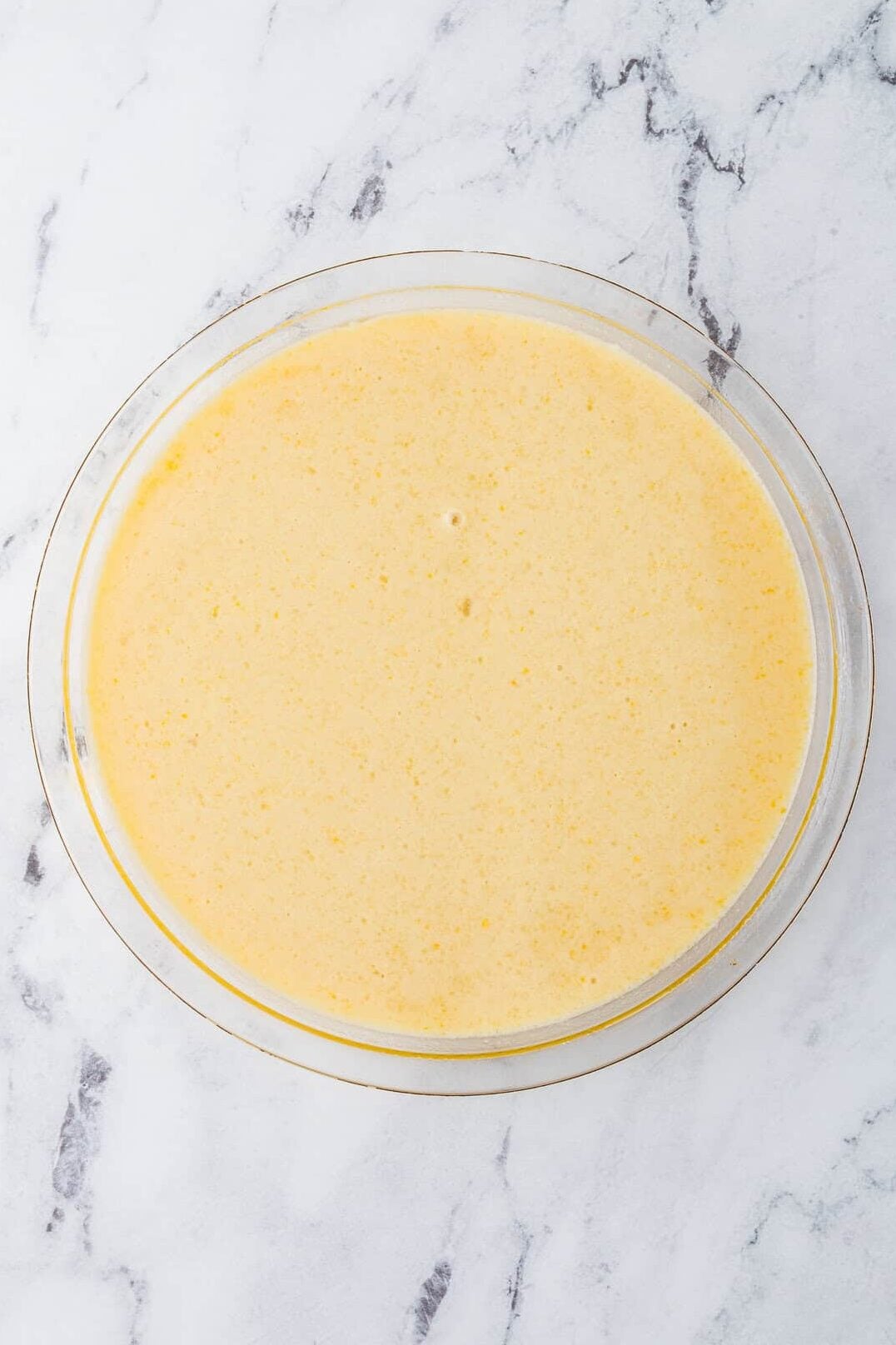 buttermilk pie filling in a pie dish