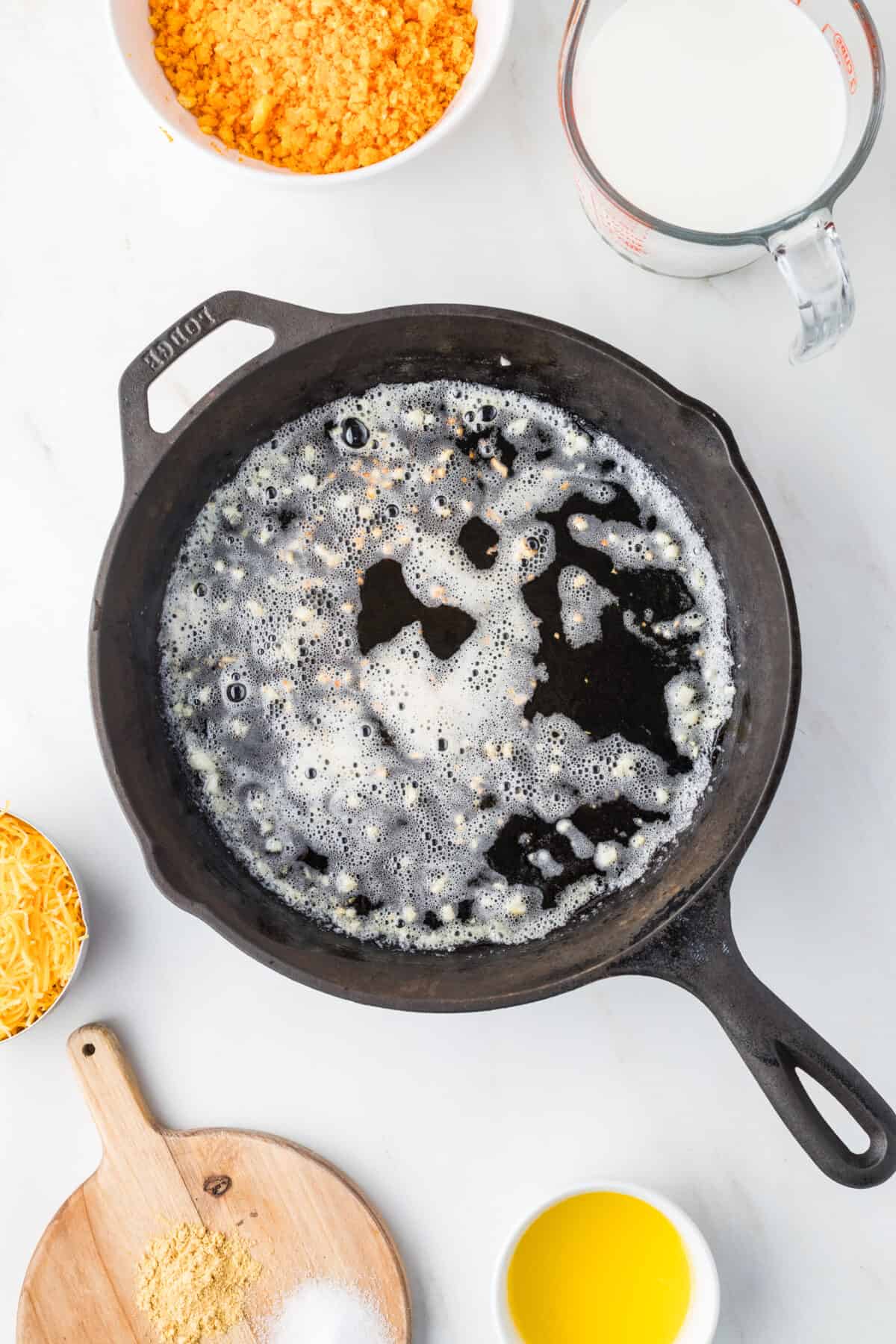 melted butter and garlic in skillet