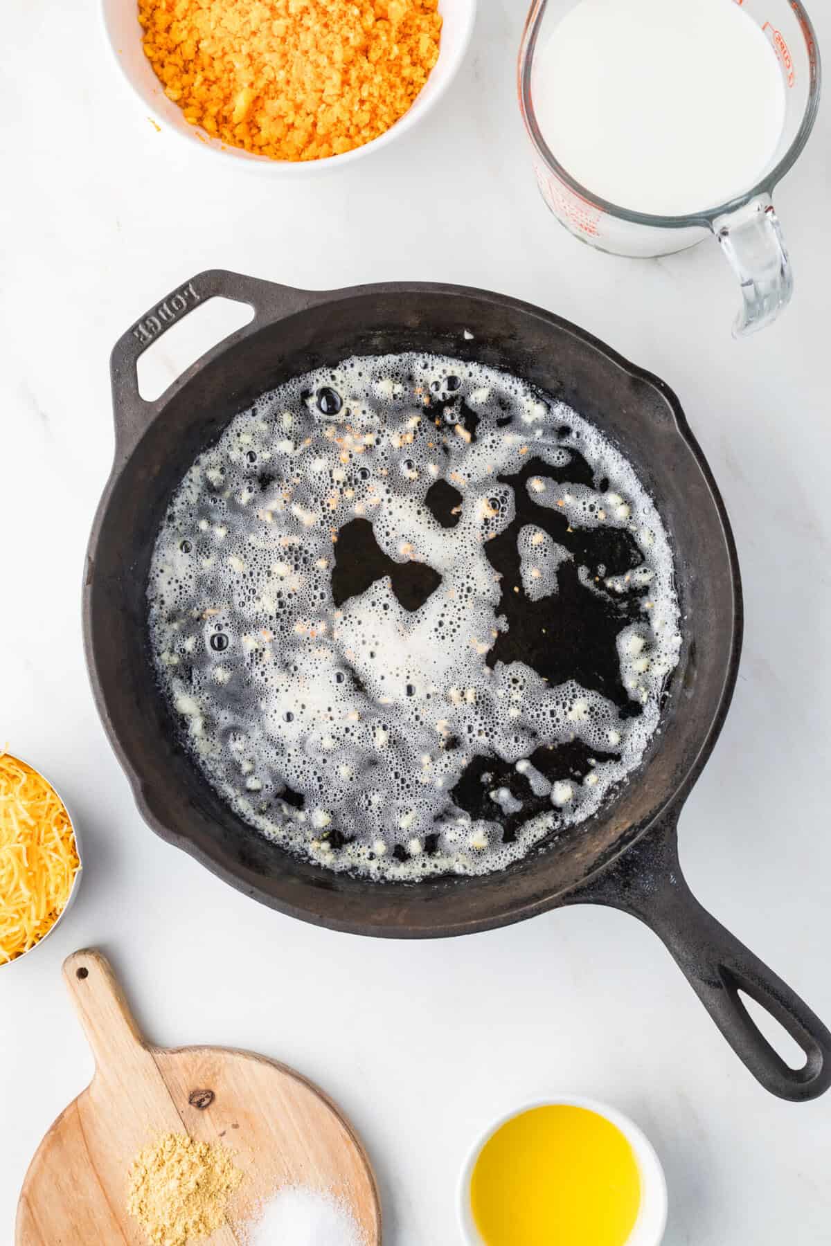 melted butter and garlic in skillet