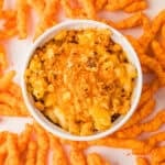 bowl of cheetos mac and cheese surrounded by cheetos