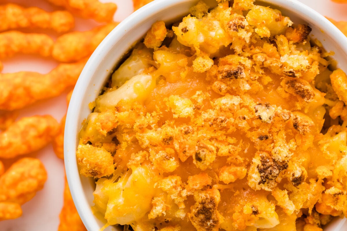 bowl of cheetos mac and cheese surrounded by cheetos