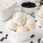 scoops of coffee ice cream in a white bowl