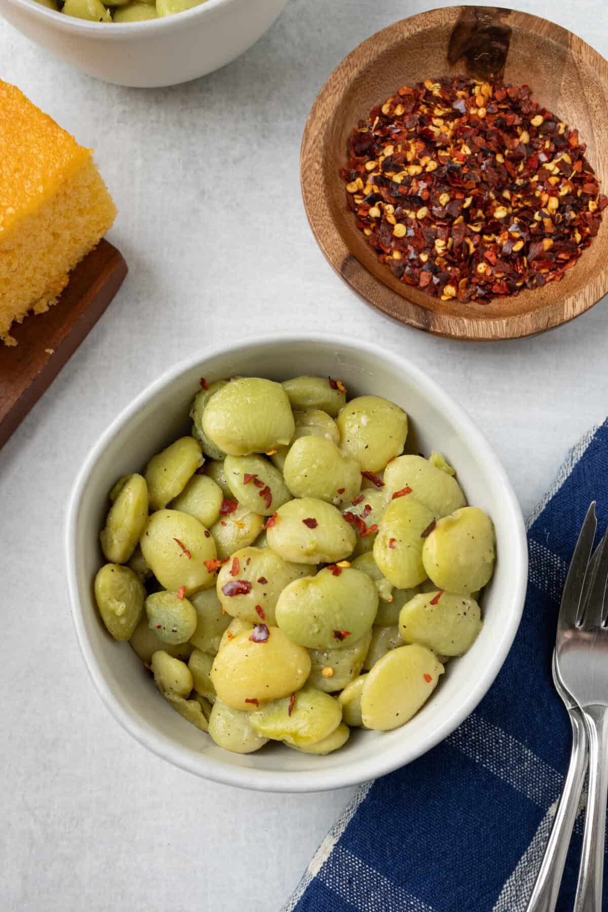 bowl of butter beans with red pepper flakes