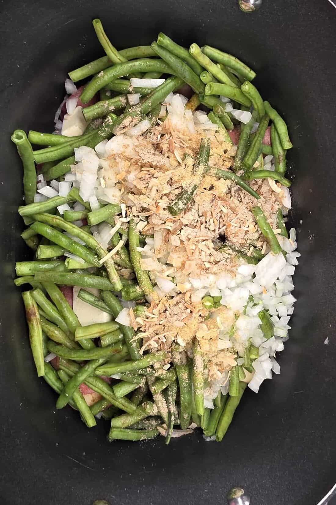 onion soup mix over cut up green beans and onion