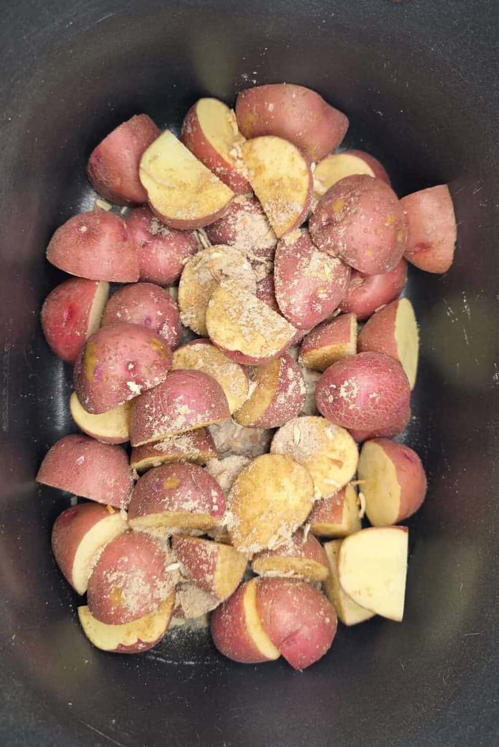 cut up potatoes with lawry's seasoning salt on top