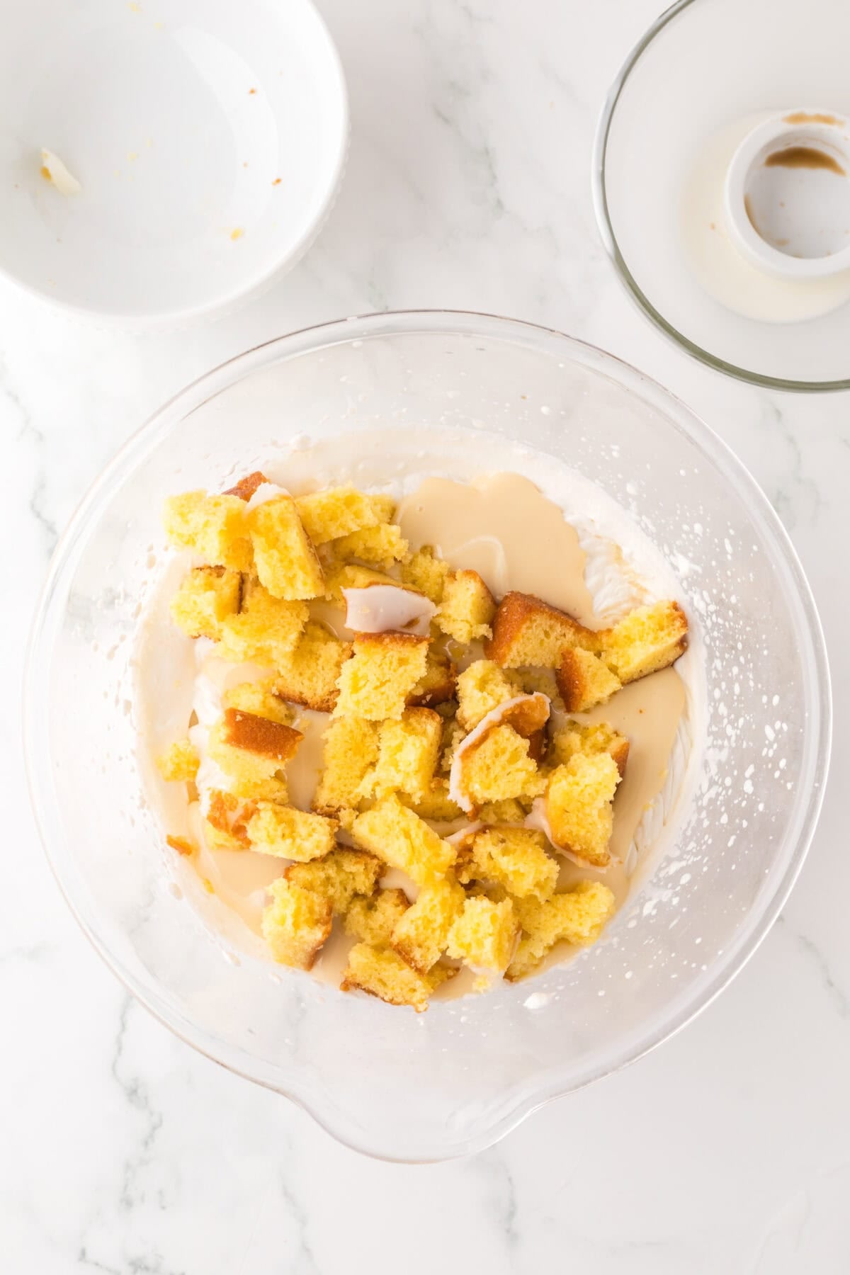 lemon cake cubes added to whipped cream