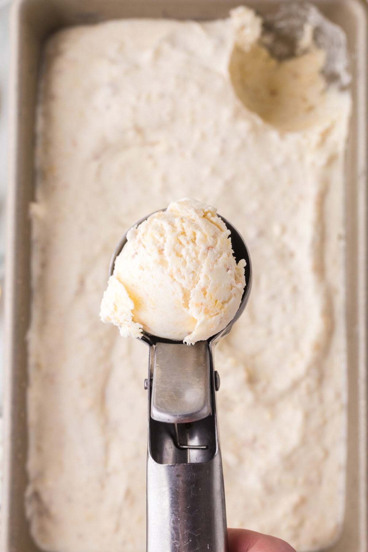 a scoop of lemon cake ice cream