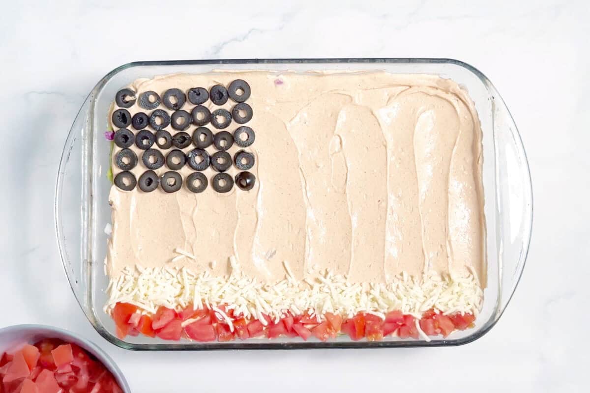tomatoes and cheese arranged in stripes