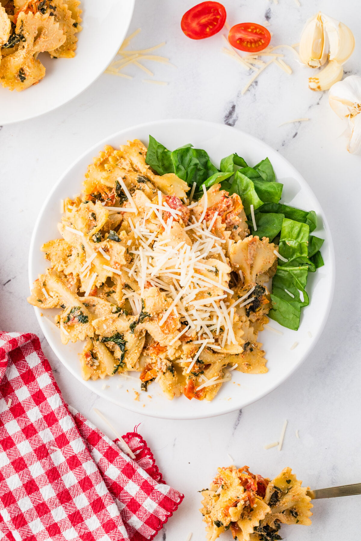 boursin cheese pasta topped with shredded parmesan