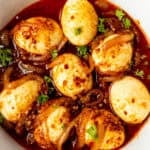 cajun egg boil in white bowl