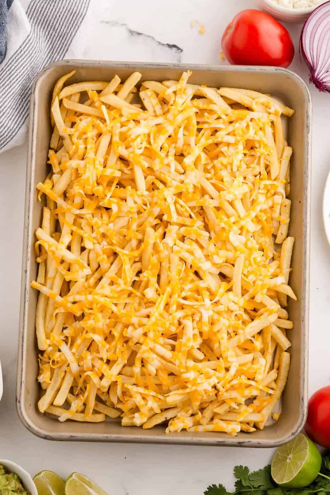 cooked fries on a baking sheet