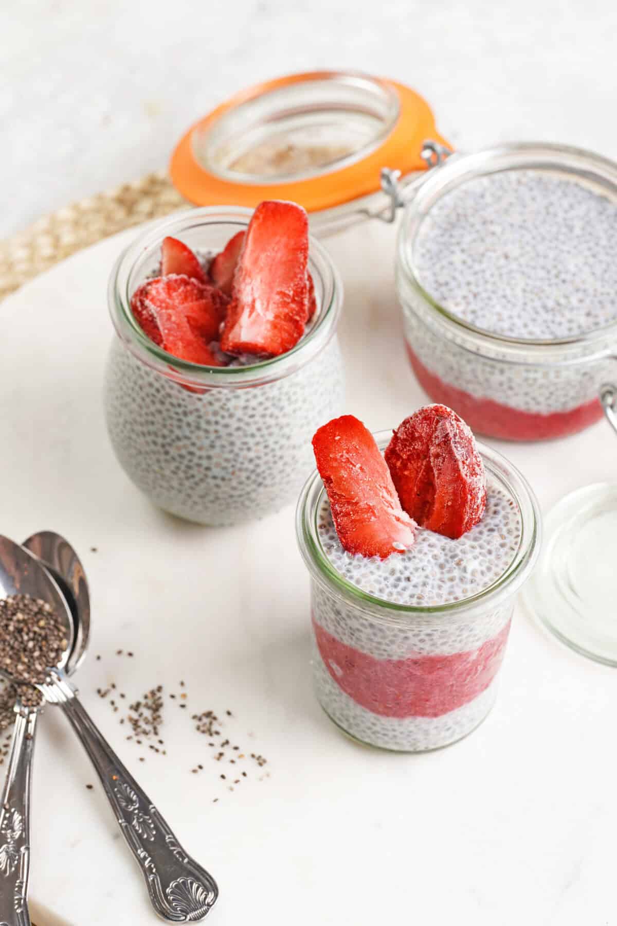 chia seed pudding in cups with strawberries