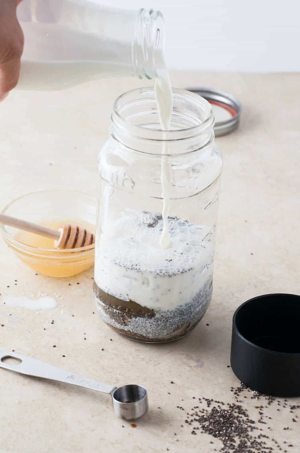 pouring milk in the jar
