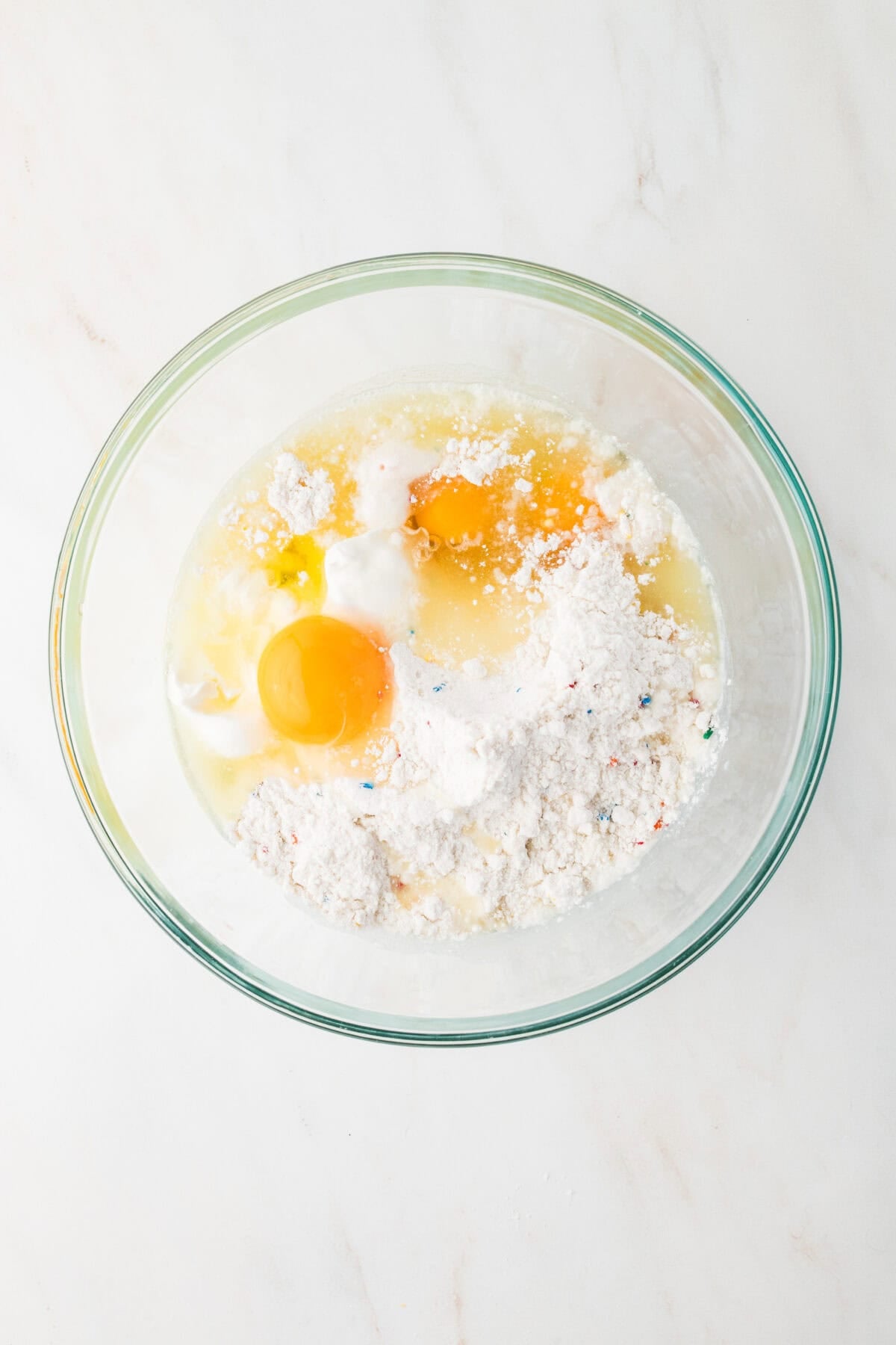 ingredients for cake batter in a bowl