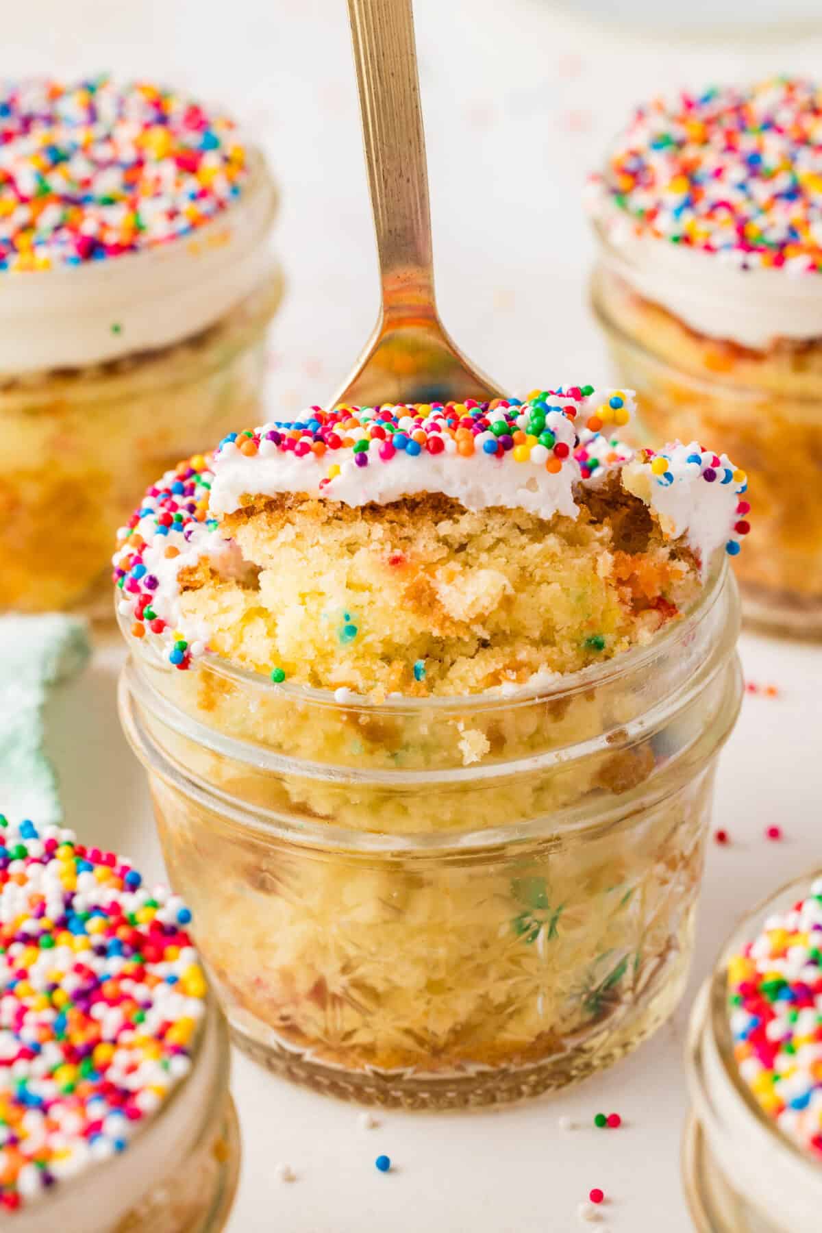 a fork in a dot cake jar