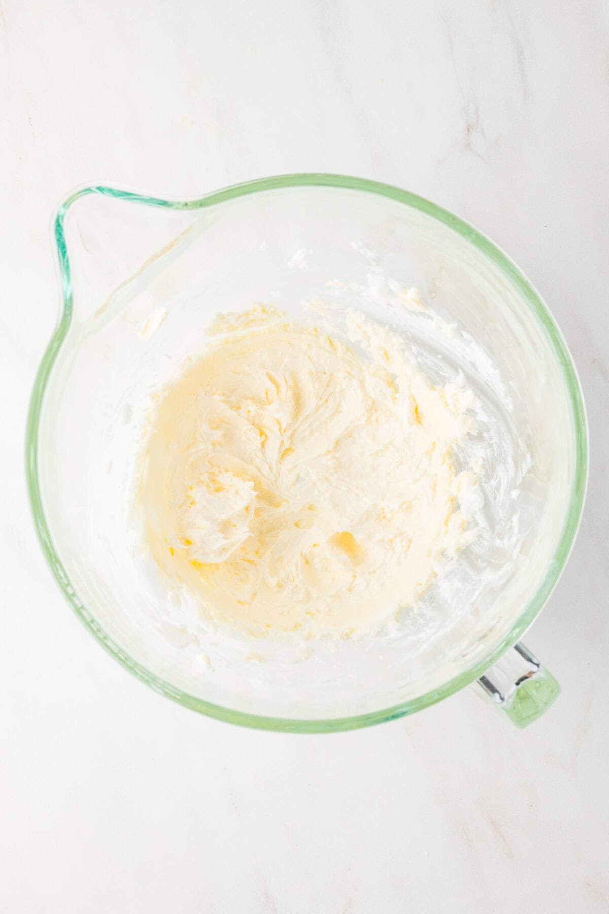 creamed butter and shortening in a mixing bowl