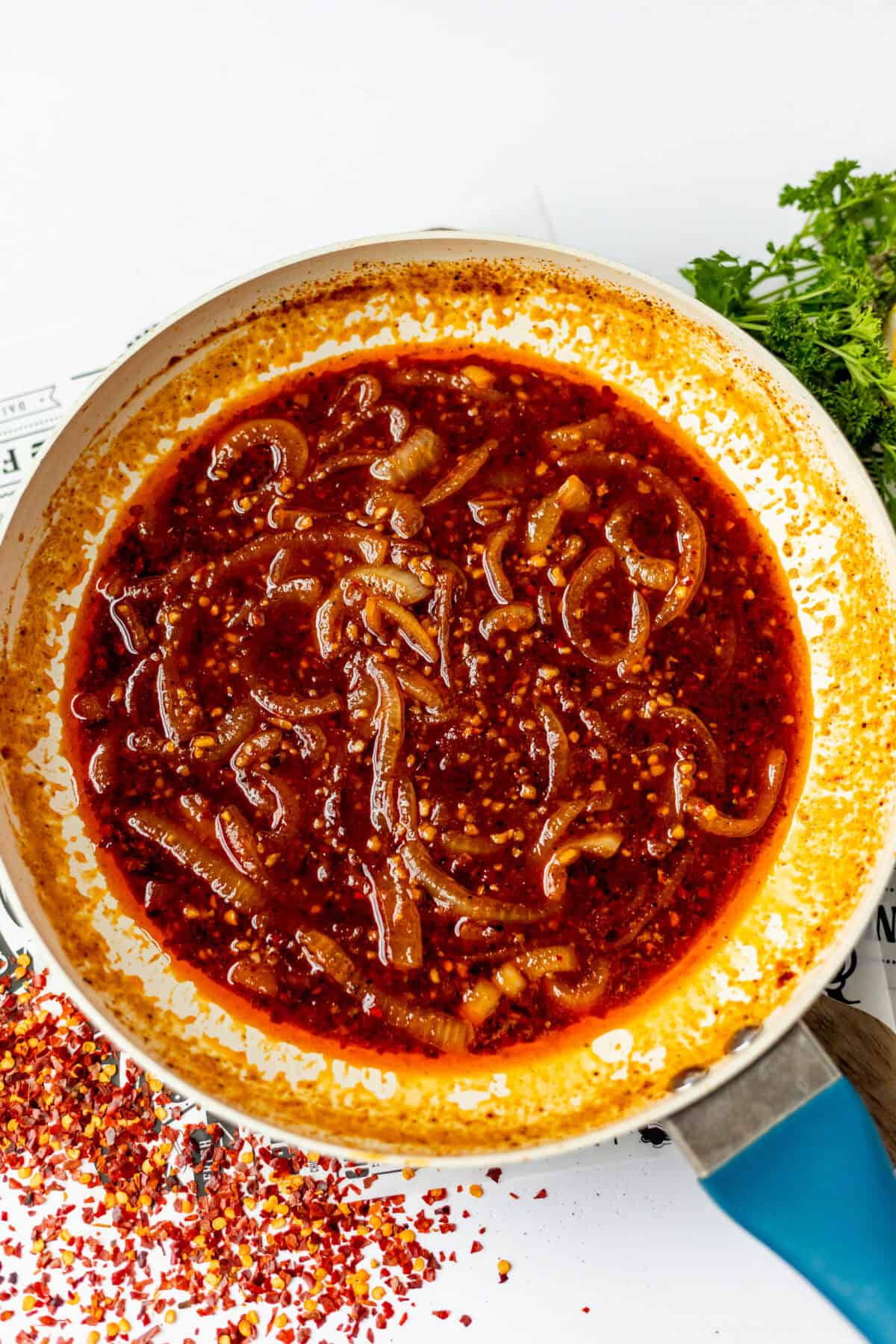 cajun egg boil sauce in a white bowl