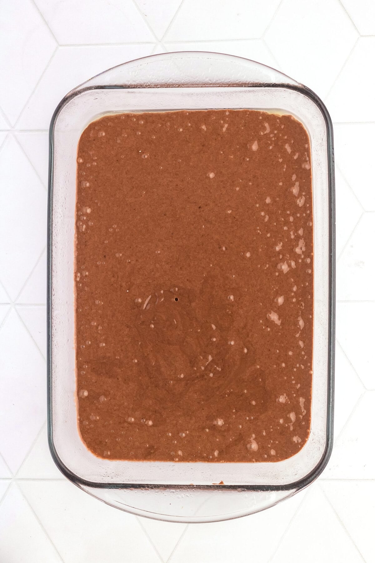 chocolate cake batter in 9x13 dish