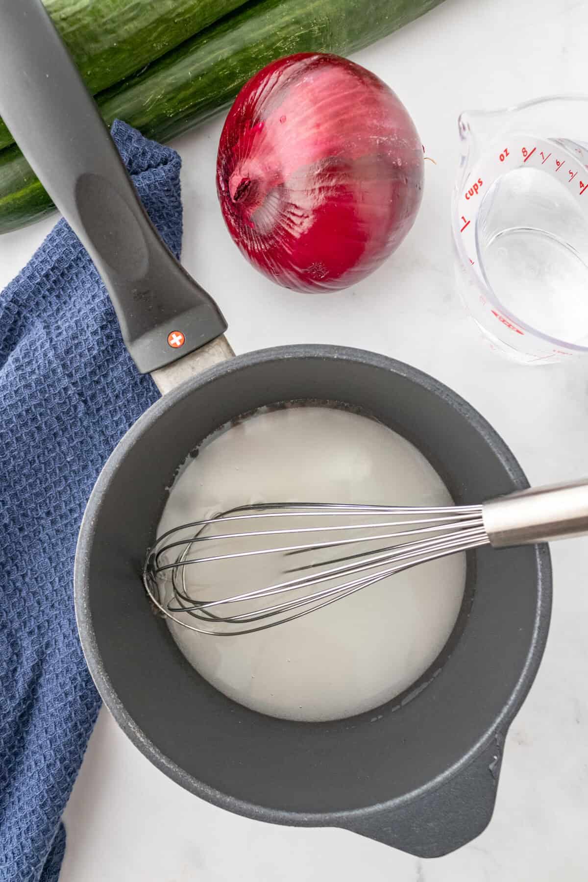 water vinegar and sugar in a pot