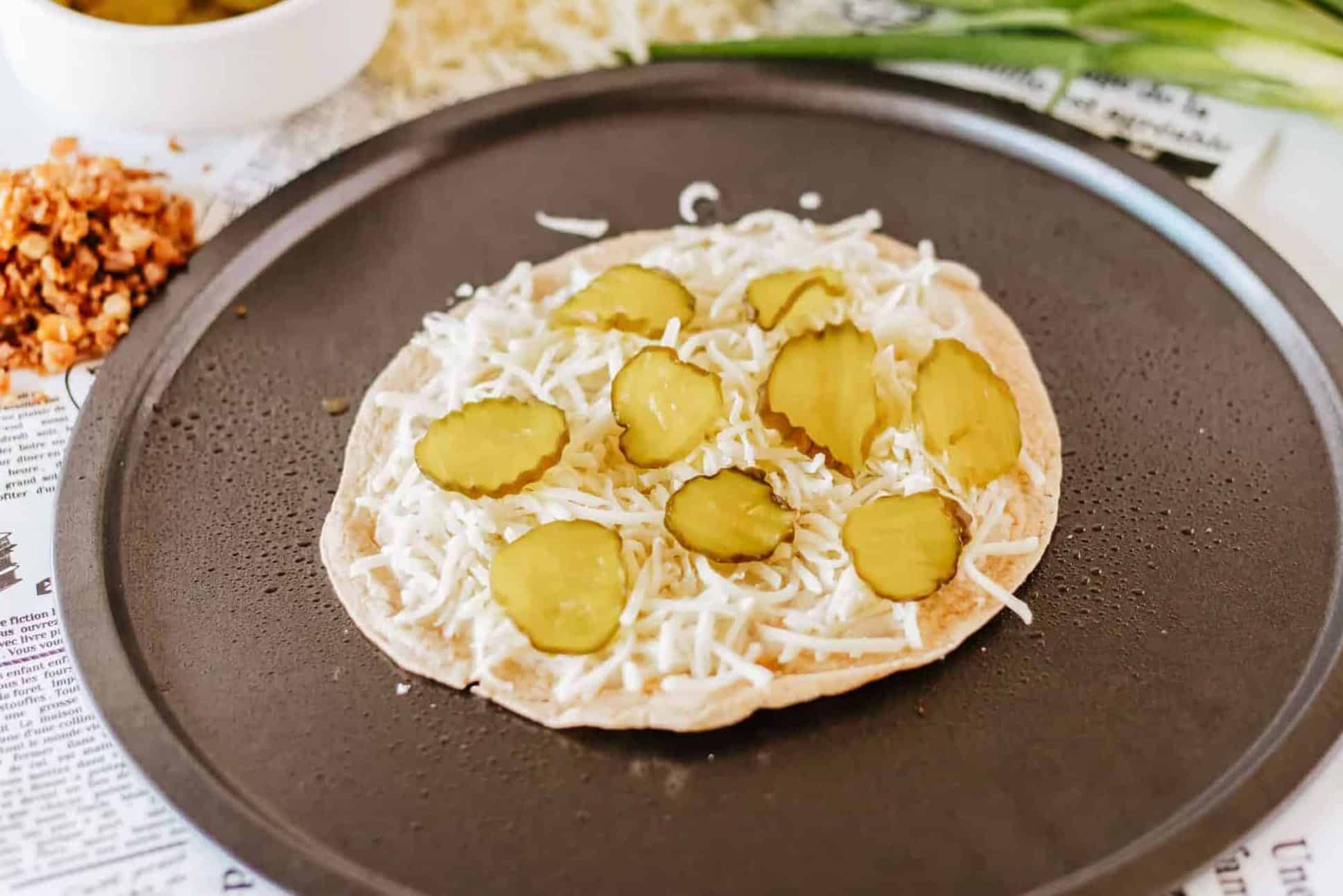 pickles on top of pizza