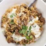 taco rice with queso and cilantro