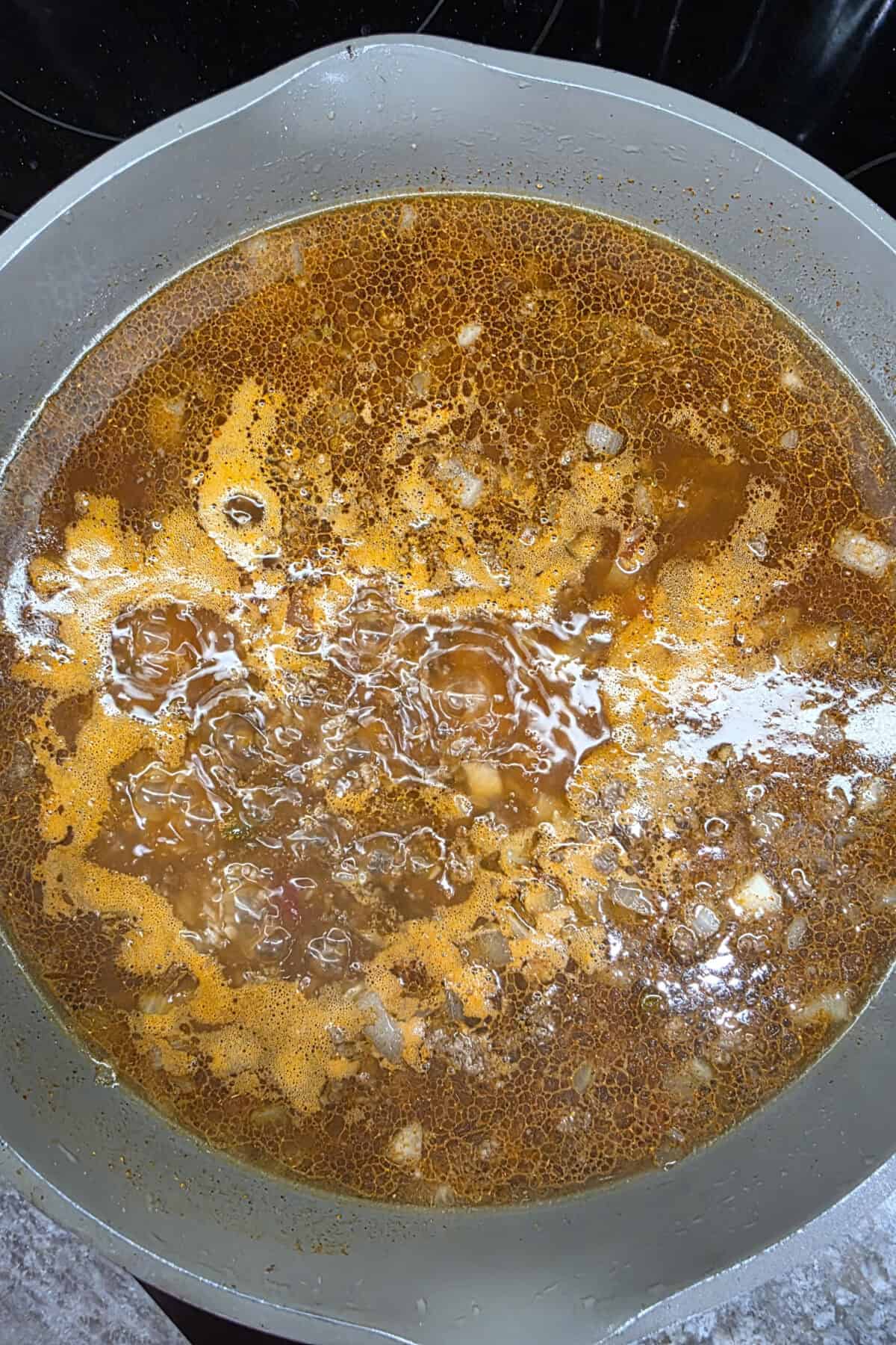 boiling meat and rice mixture