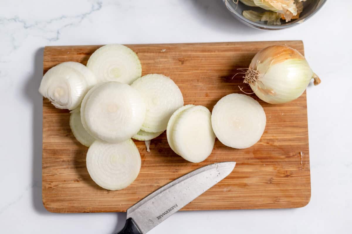 cutting onions on a cutting board