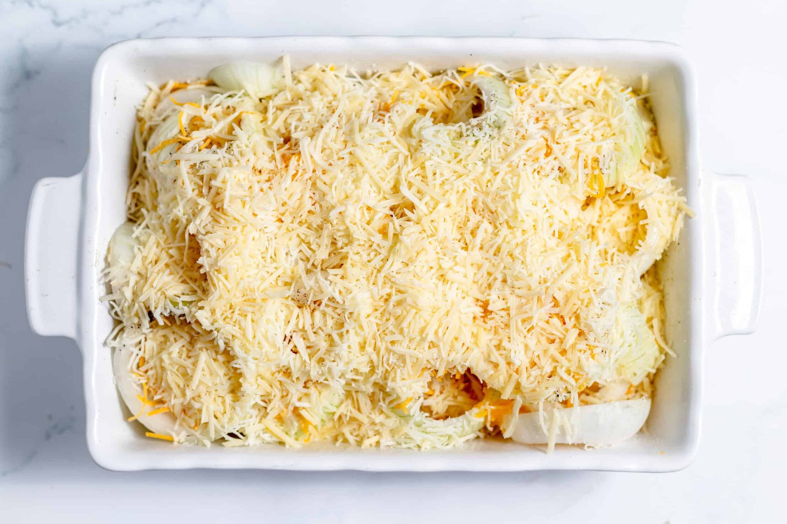 sliced onions covered in butter and cheese