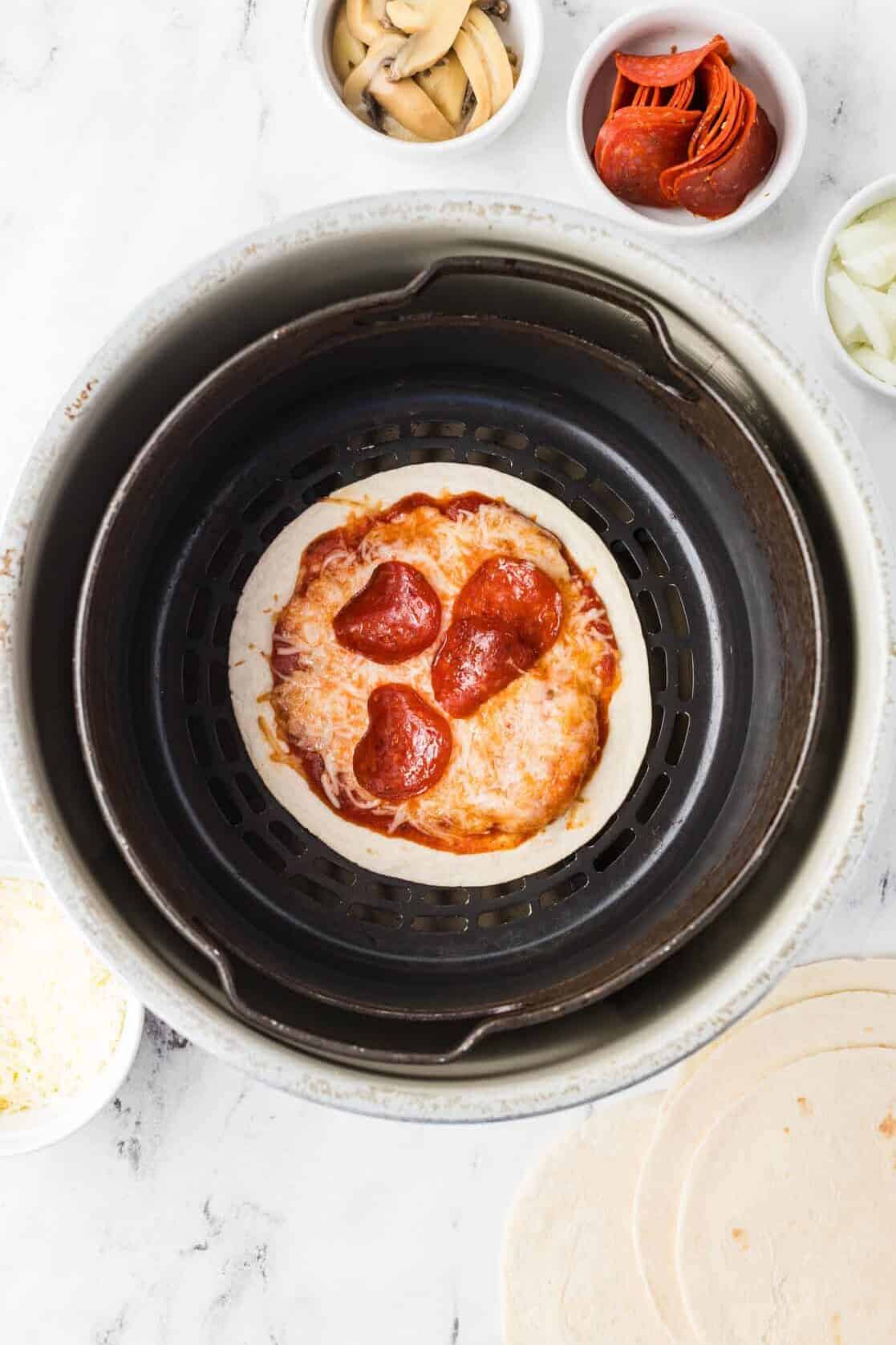 cooked pepperoni pizza in air fryer