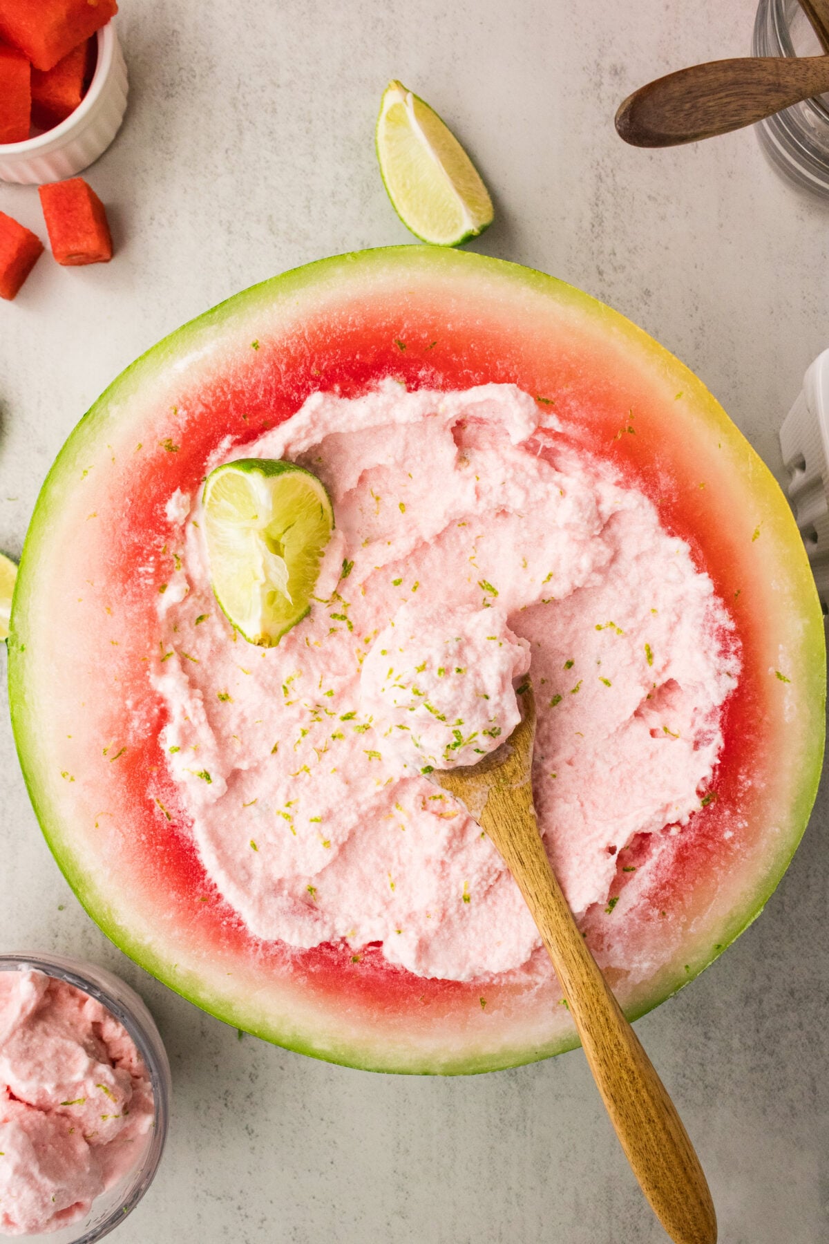 watermelon ice cream in a watermelon bowl with lime