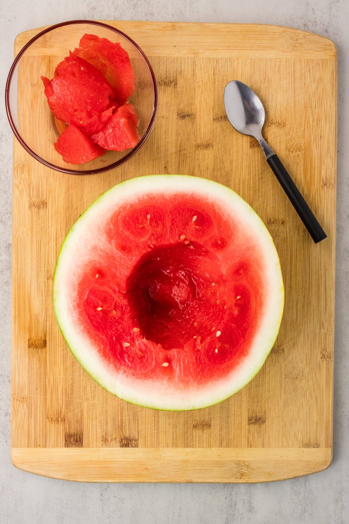center scooped out of half a watermelon