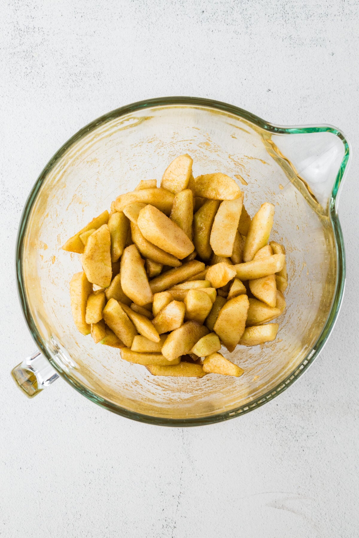 apples in skillet with melted butter