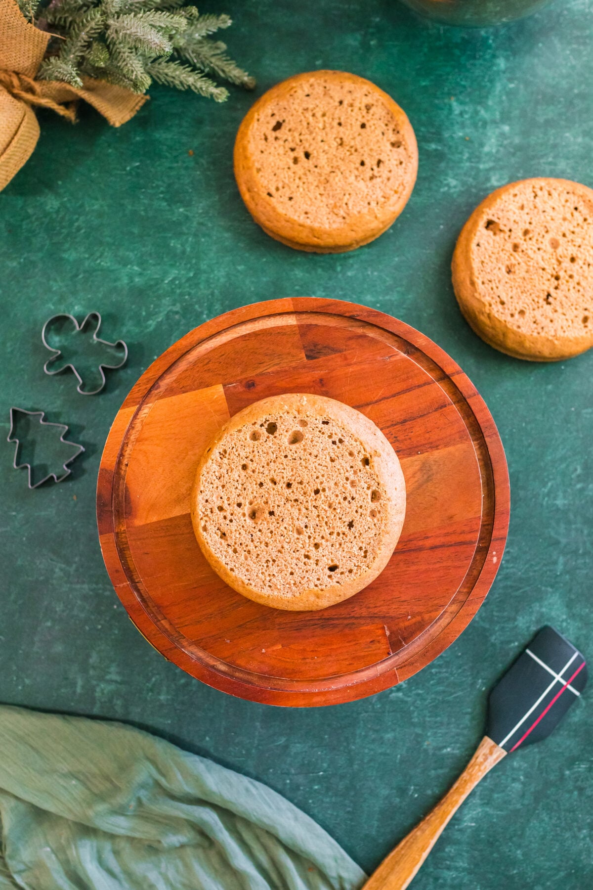 single layer of spice cake on a cake stand