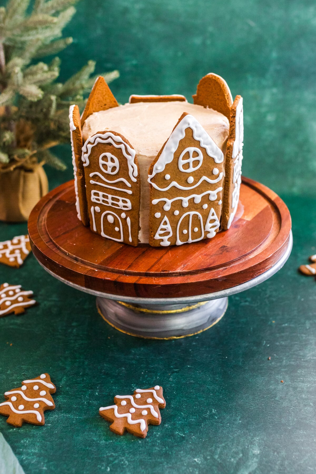 spice cake with gingerbread village around it