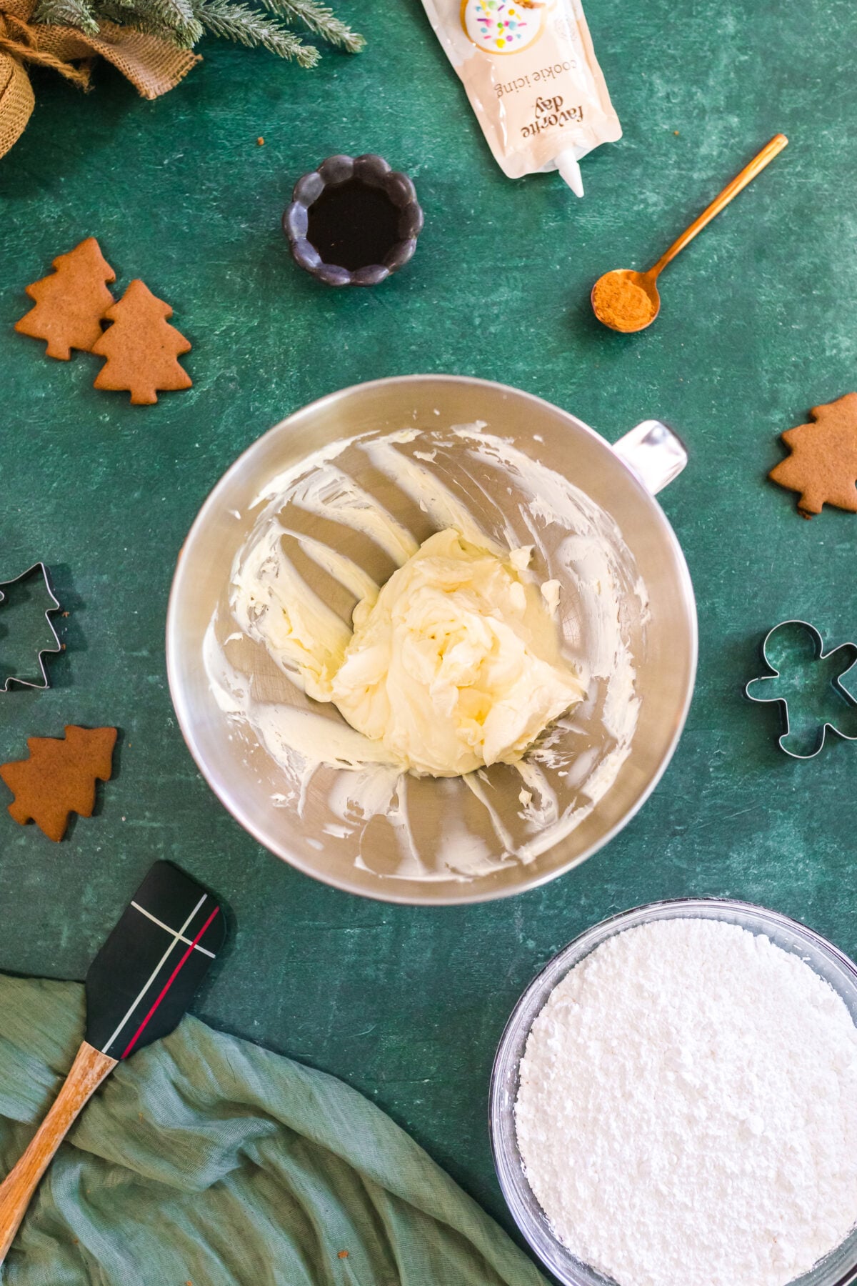 cream butter and cream cheese together in a bowl