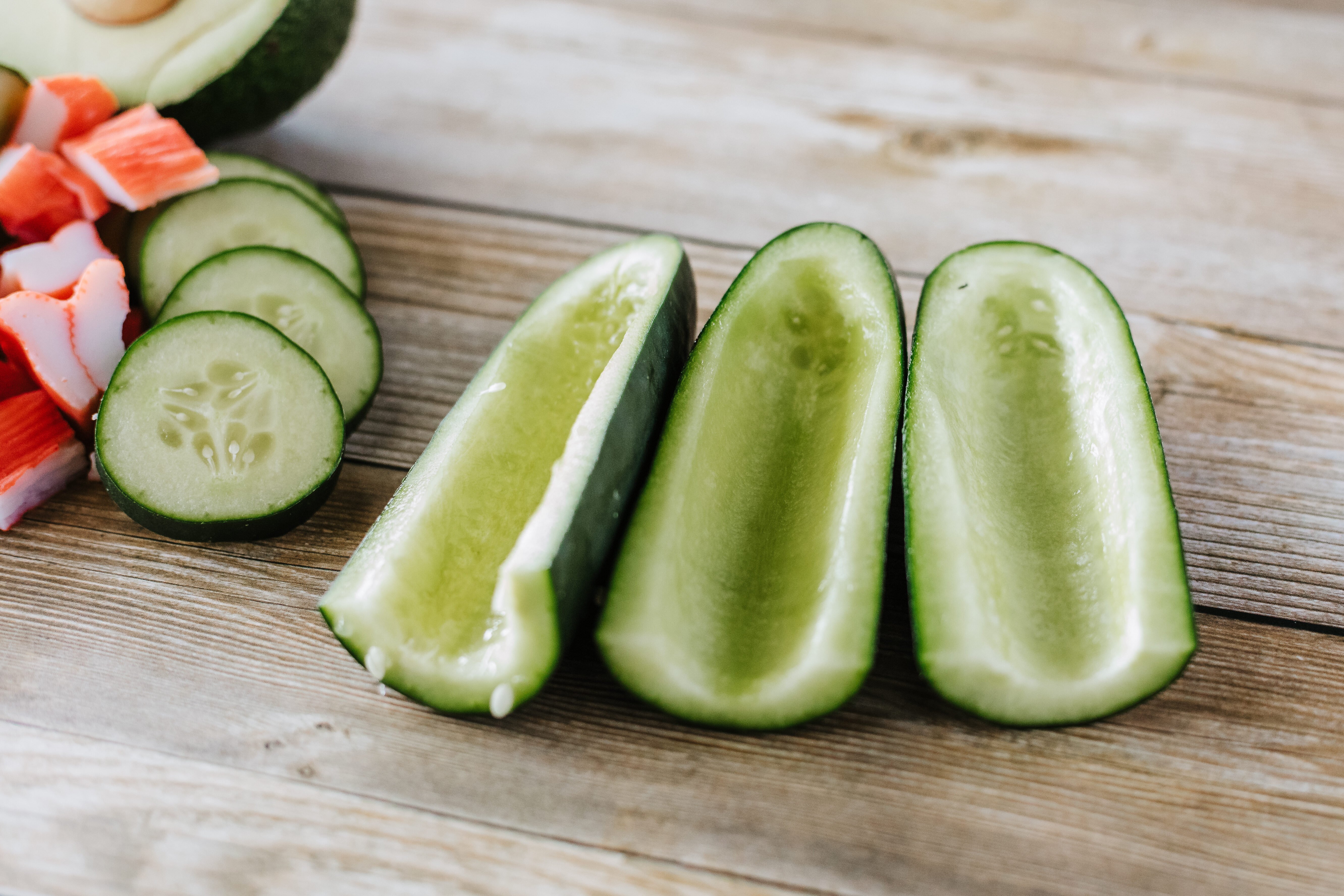 cucumbers cut in half with centers scooped out