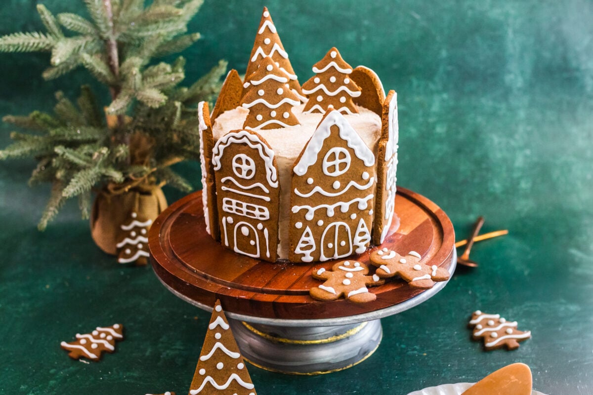 spice cake with gingerbread village around it