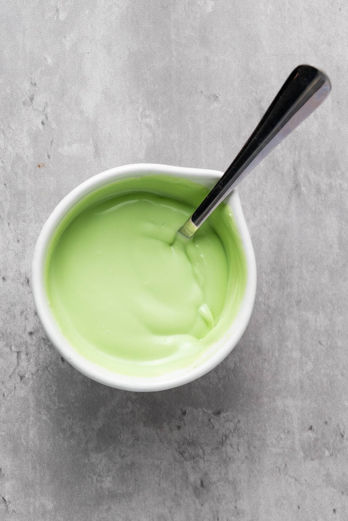 melted green candy melts in a bowl