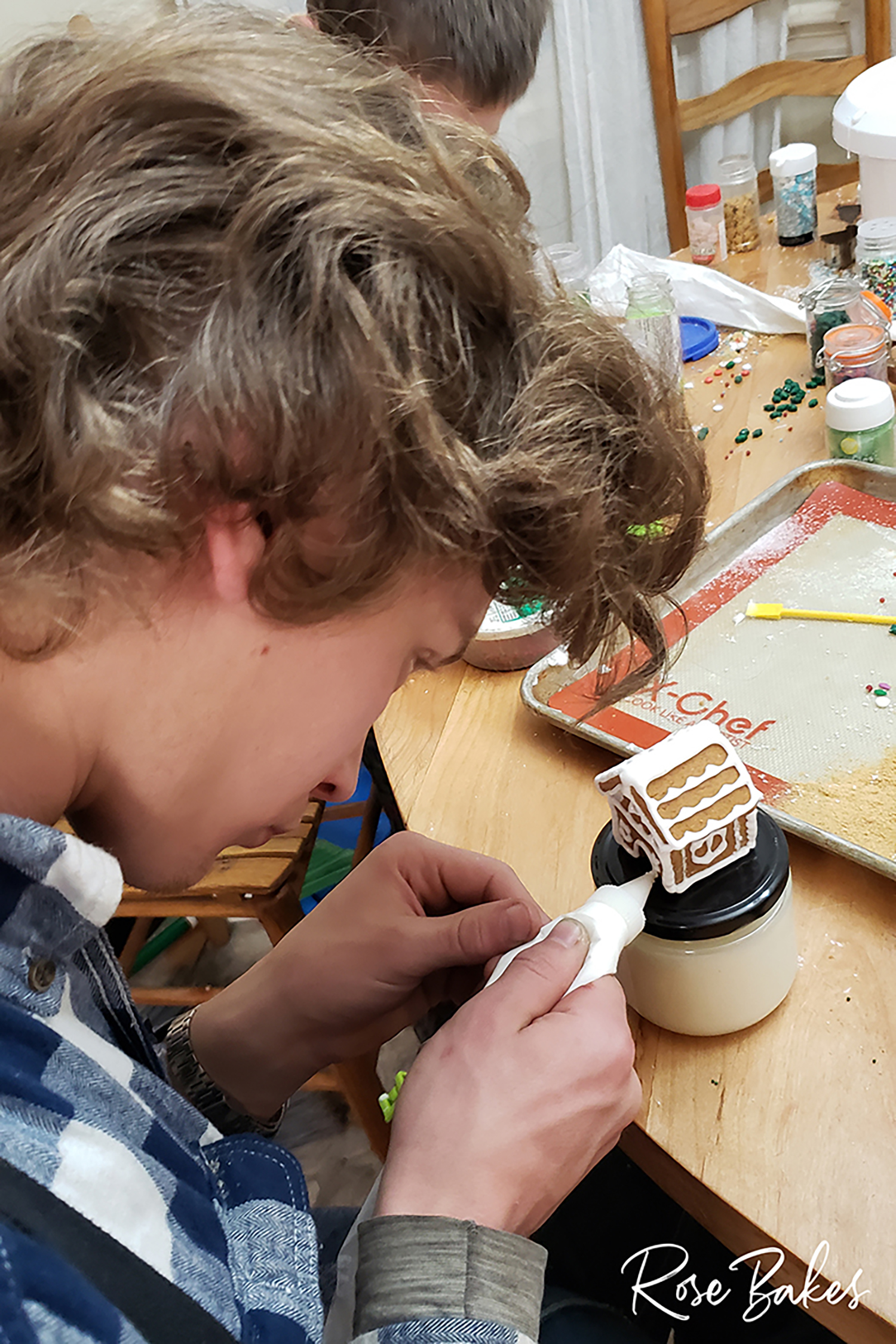 joshua working on gingerbread house