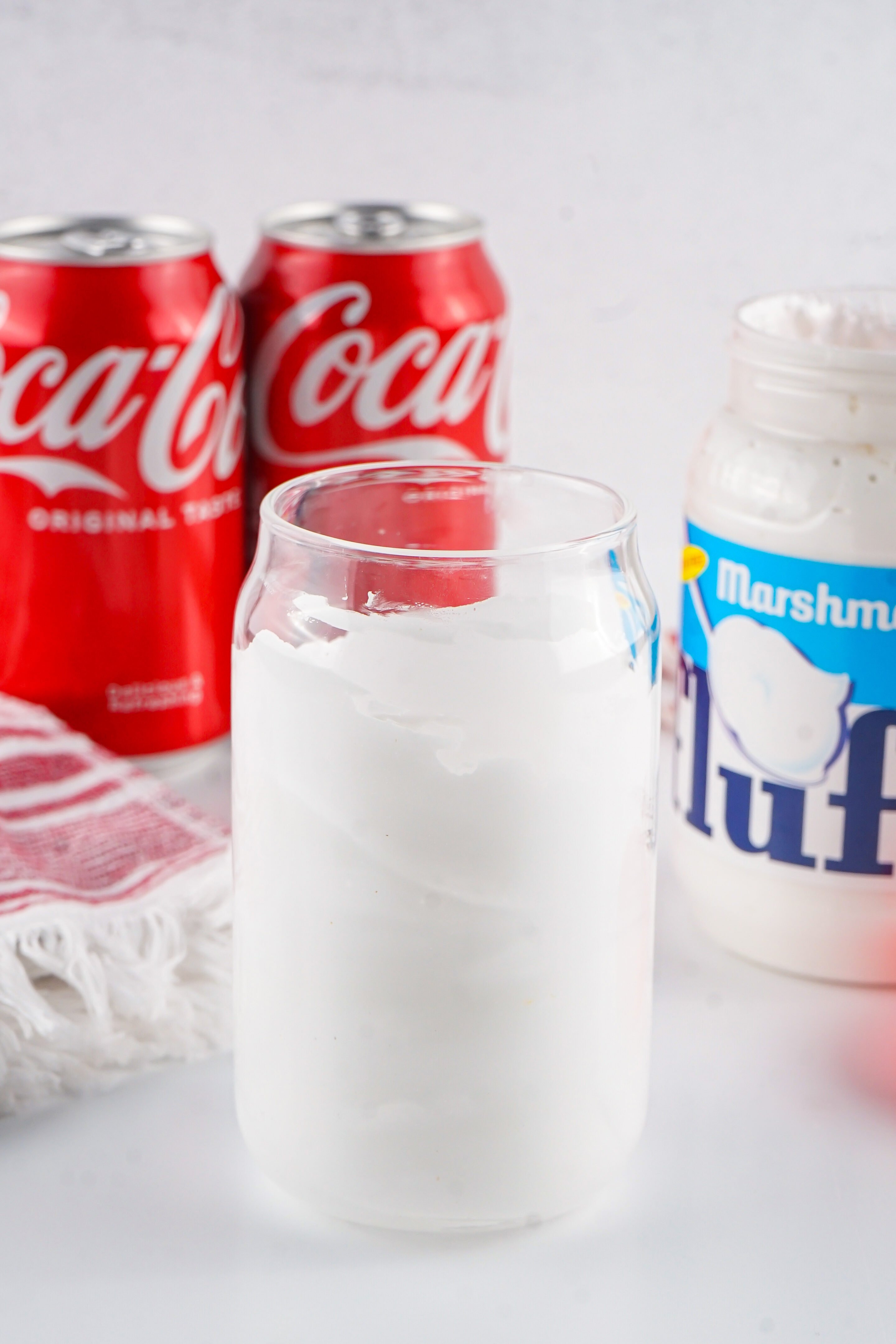 glass with marshmallow creme all around the inside