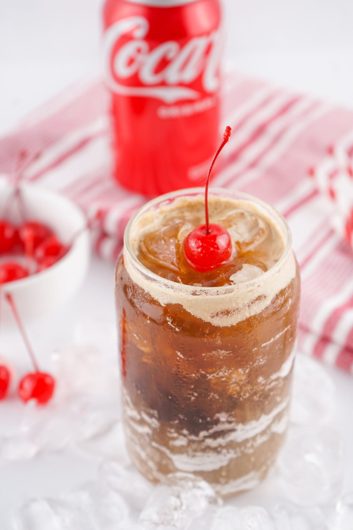 fluffy coke with a cherry