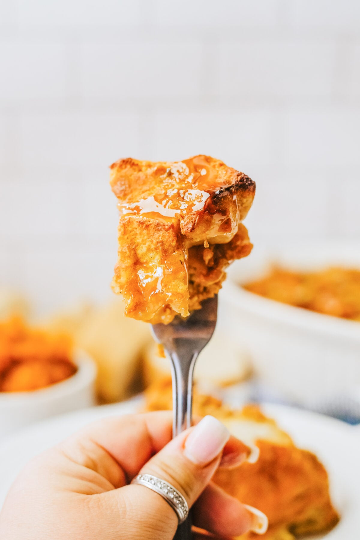 fork full of pumpkin bread pudding